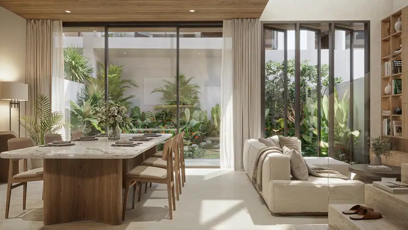 Ruang keluarga villa 2 kamar yang terbuka ke taman